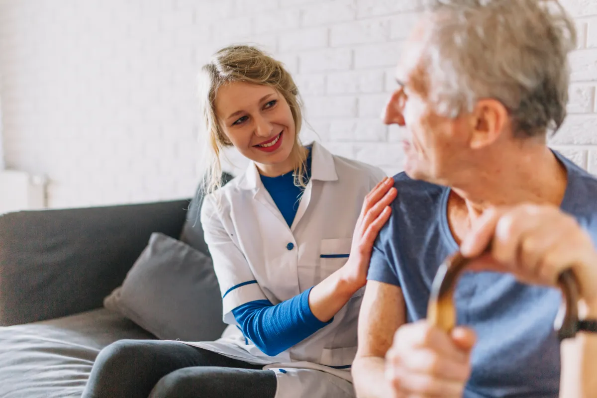 man-smiling-nurse-nursing-home